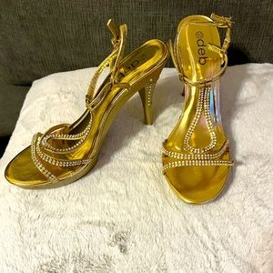 Gold with sparkle encrusted four inch dress heels